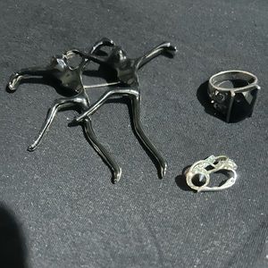 Ring/earrings and theatre brooch.